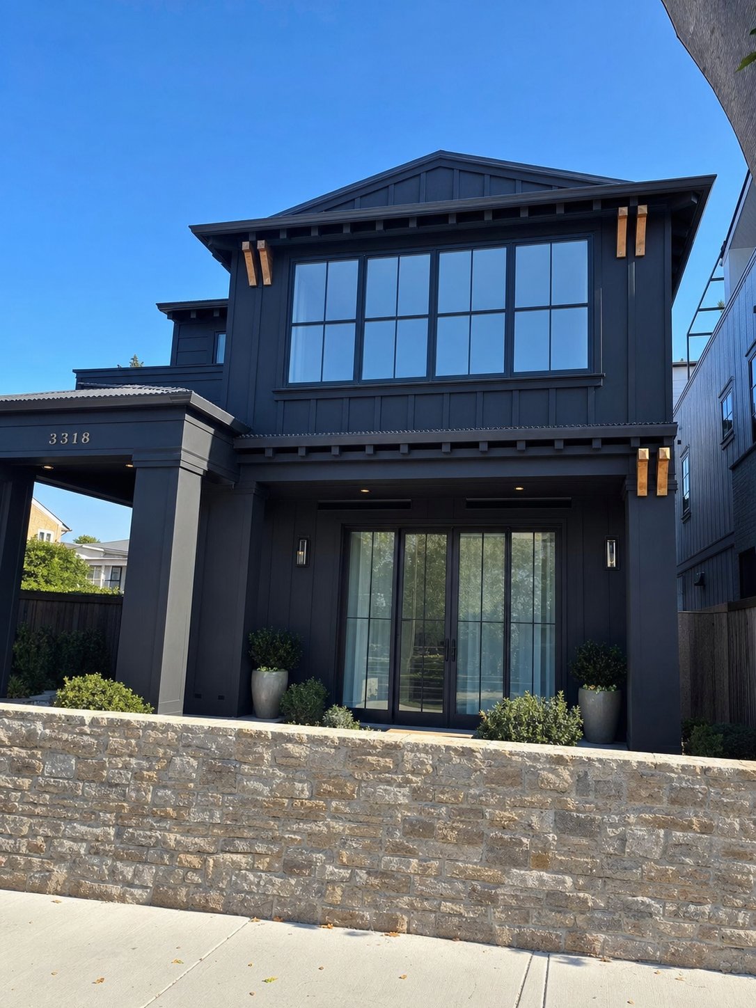 Black board-and-batten modern farmhouse curb view